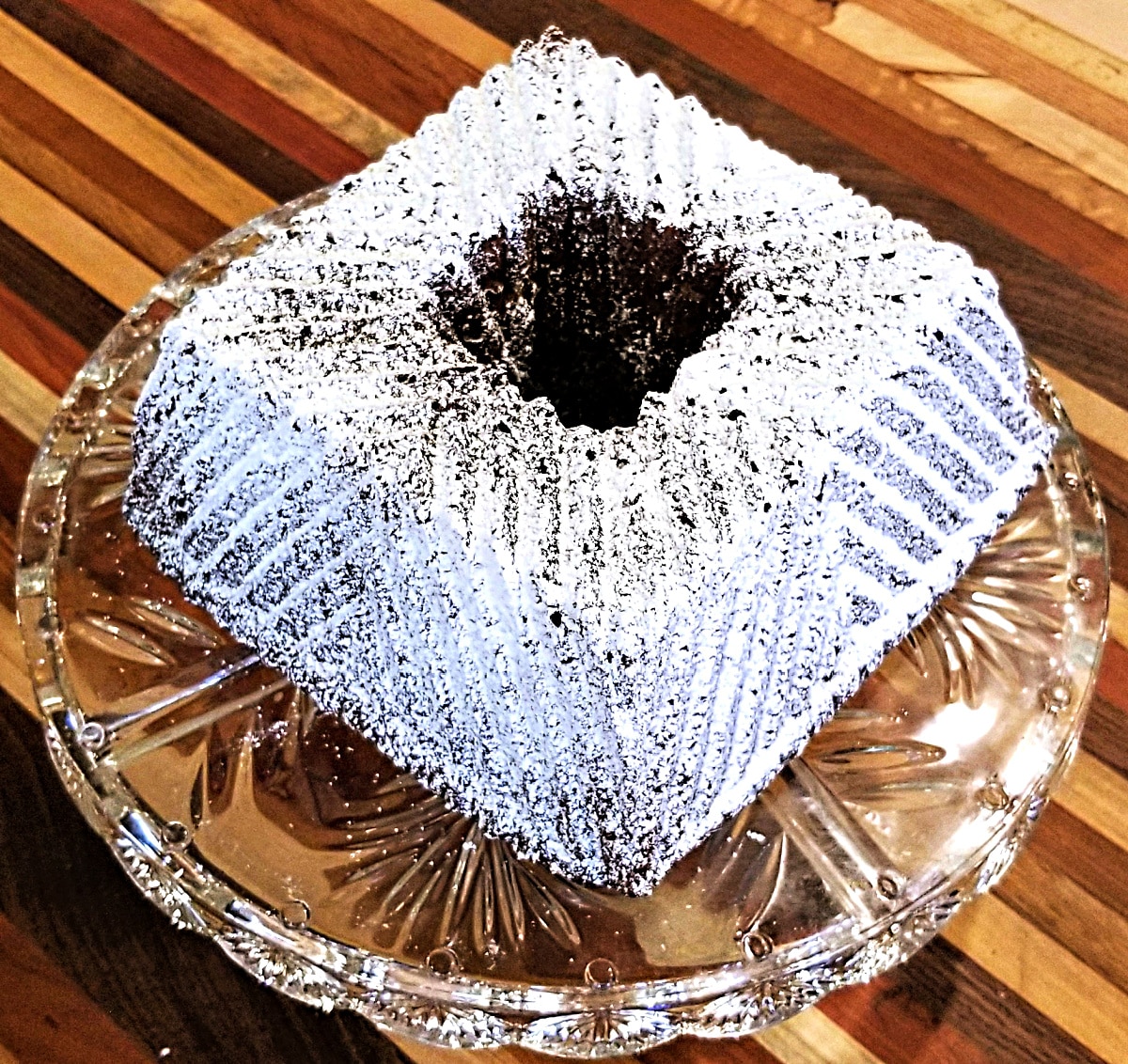marbled banana bundt cake on cake stand