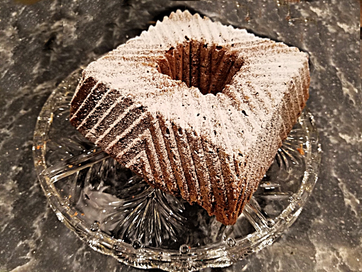 banana bundt cake on a pedestal stand