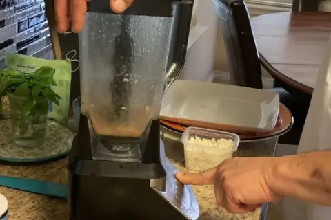 blend anchovy fillets, garlic cloves, and red wine vinegar