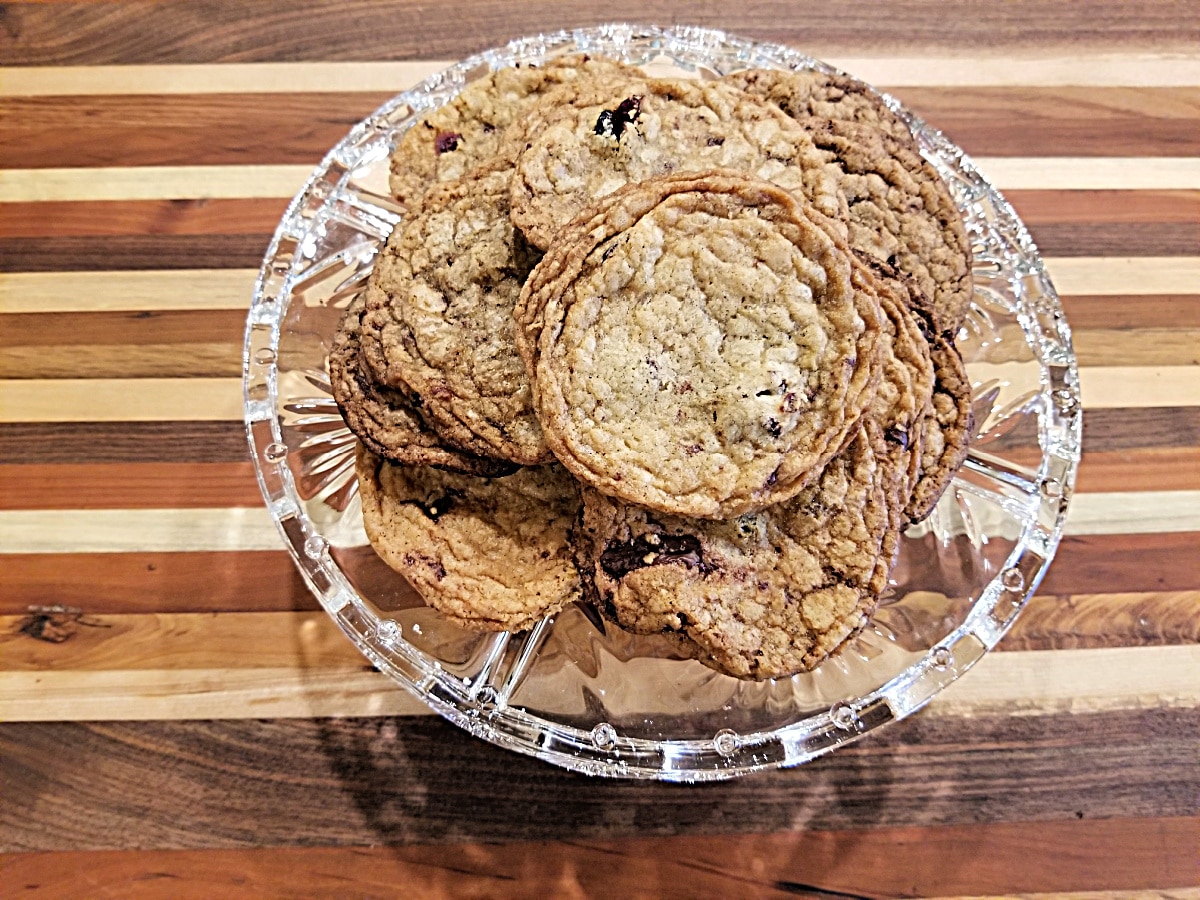 chocolate chunk cookies on a cake stand
