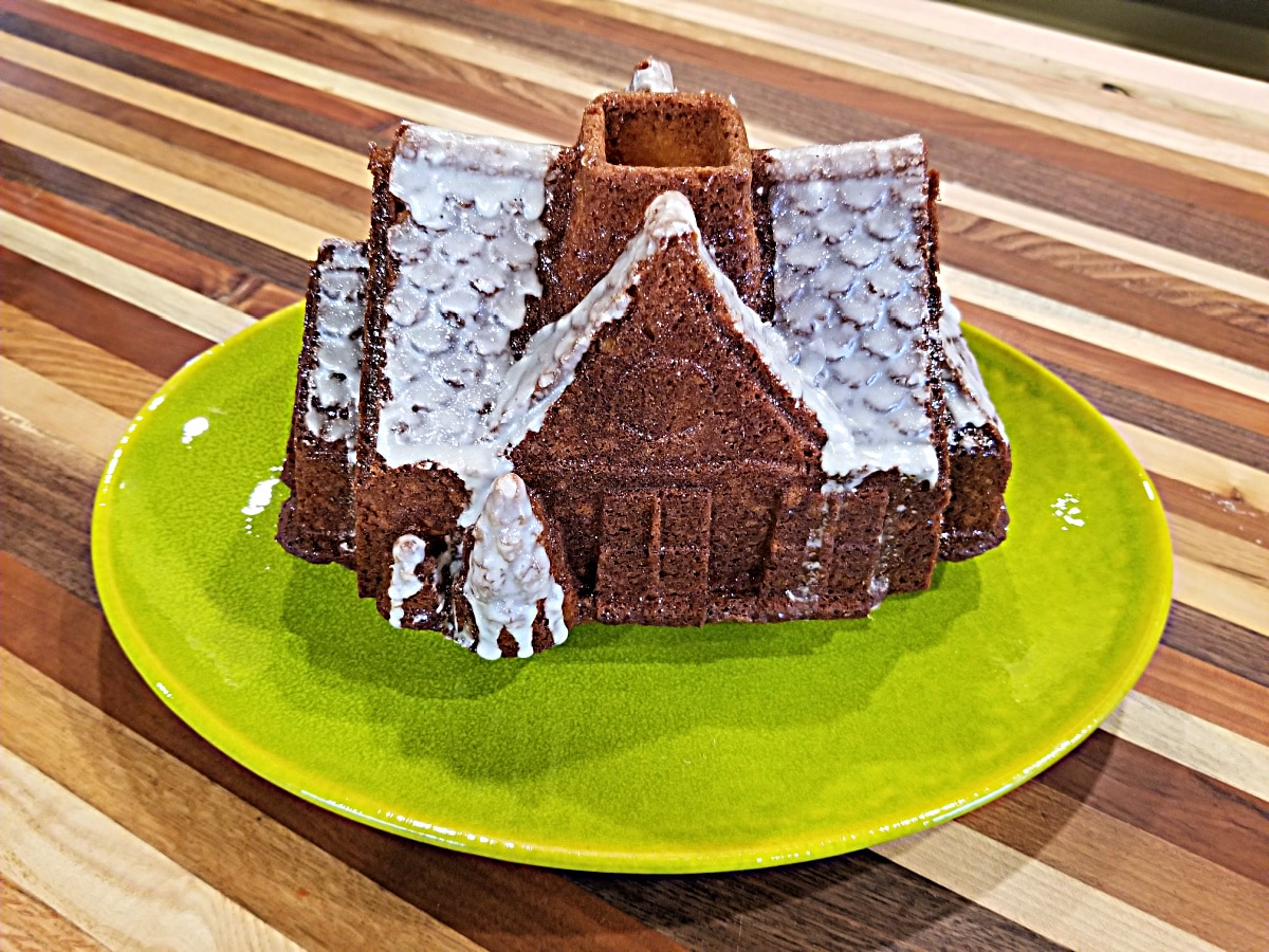 lemon bundt cake in house mold with drizzle